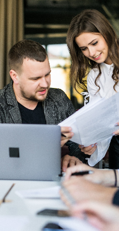 Man & Woman reviewing paperwork