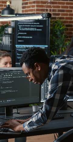 Man typing on computer